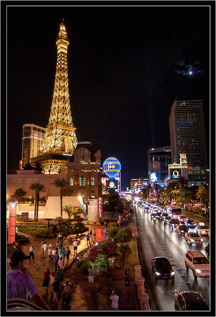 A view of the Vegas Strip At Night, showing the Eiffle Tower Restaurant.