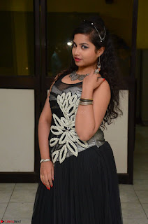 Shrisha Dasari in Sleeveless Short Black Dress At Follow Follow U Audio Launch 026.JPG