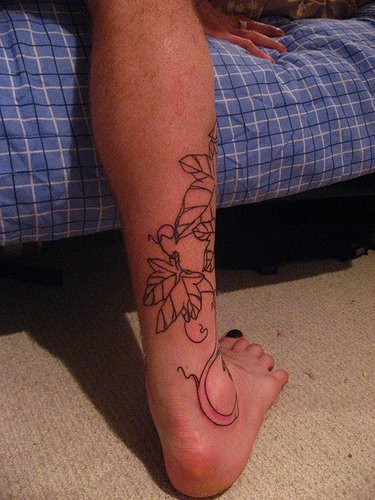 flower ankle tattoos