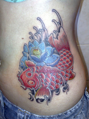 japanese goldfish tattoo meaning. Top Side Body Tattoo Designs
