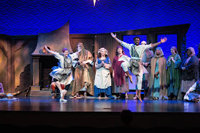 IN REVIEW: the cast of Greensboro Opera's December 2019 production of Gian Carlo Menotti's AMAHL AND THE NIGHT VISITORS, with dancers CHELSEA HILDING and D. JEROME WELLS in the foreground [Photograph by VanderVeen Photographers, © by Greensboro Opera]