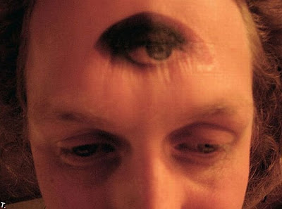 Strange bald head tattoos Seen On www.coolpicturesgallery.blogspot.com