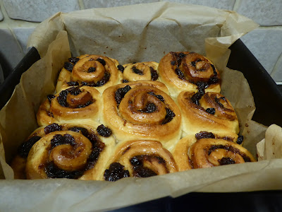 Chelsea buns in a square baking tin.