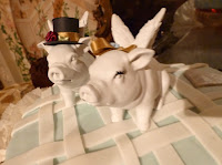 Pigs top wedding cake