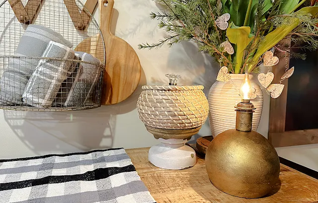 gold flame light on kitchen shelf