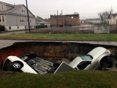 Ground (Sinkhole) Opens In Chicago, Swallowing 3 Cars