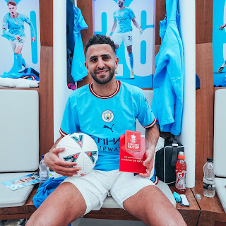Manchester City Algerian winger, Riyad Mahrez, poses with his FA Cup Player Of The Match Award