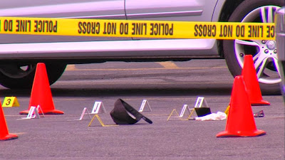 The 31-year-old male shooter was in Macey's parking lot in Orem, 45 miles south of Salt Lake City, when he heard a woman's screams as she was being pulled from her SUV by the suspect, investigators said. (KSL -TV)