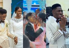 Gospel Singer Moses Bliss and his wife, Marie, seal their union with a Holy Kiss