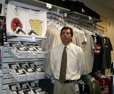 Benjamin Van Scoyoc posing by t-shirt display