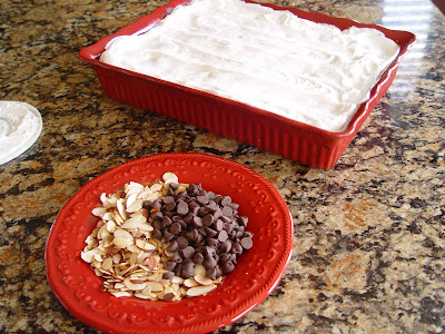 Spread the cool whip over the cherries and sprinkle with the chocolate chips