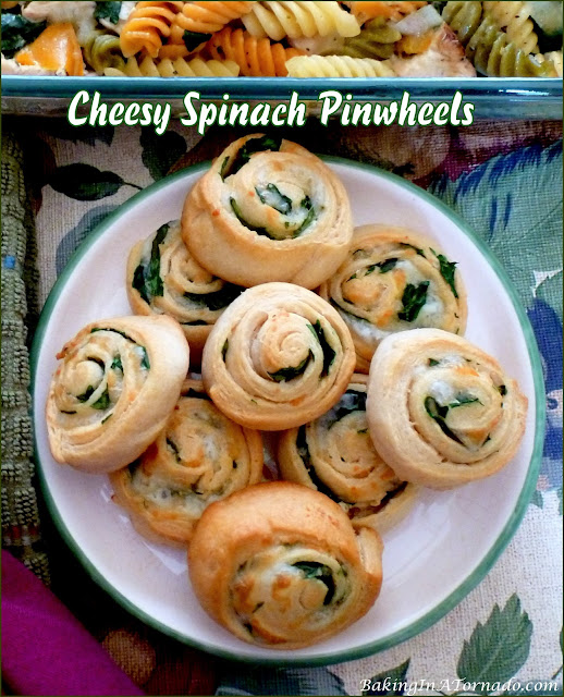 Cheesy Spinach Pinwheels | recipe developed by Karen of www.BakingInATornado.com | #recipe #bread