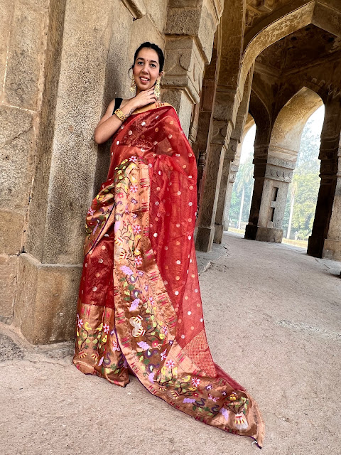 Double tissue kota doria saree with polka dots and jungle themed motifs