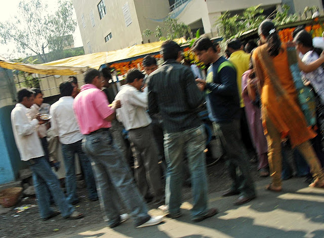 young people eating street food