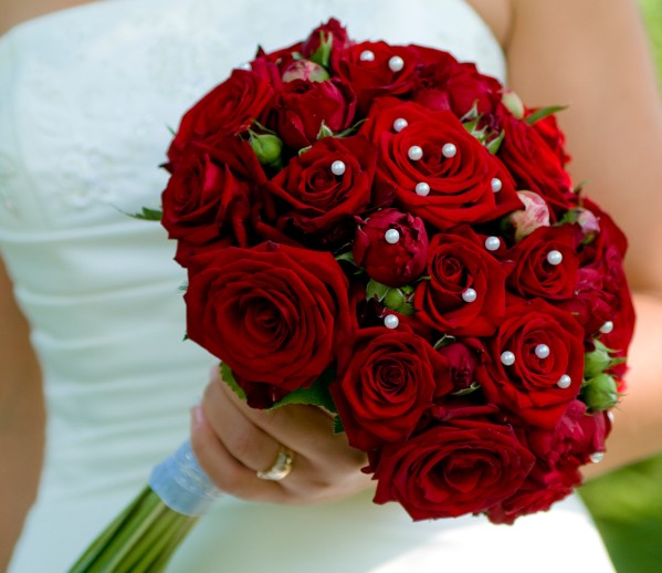  of roses on my wedding day so I'm going with all red the darker the 