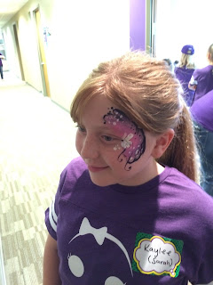 Young girl with a pretty face painting design