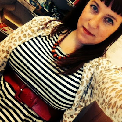 plus size pin up outfit for work in mixed prints black and white striped dress with leopard print cardigan