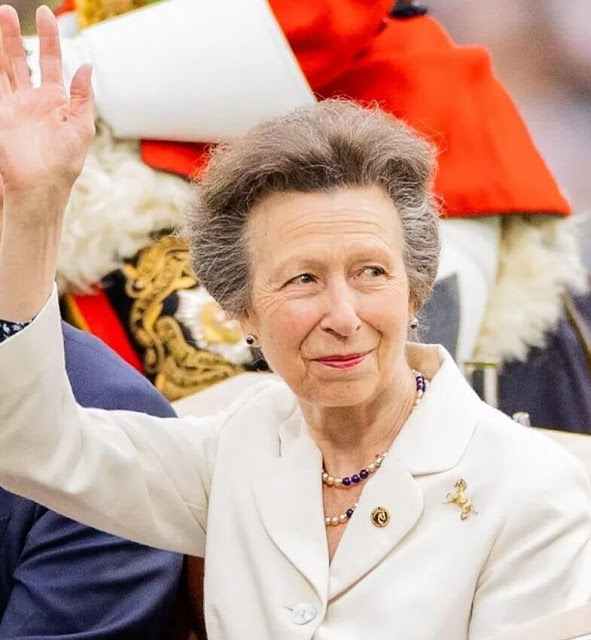 Princess Anne pinned her golden horse brooch to her blazer. Anne wore a floral print dress with a fitted cream blazer