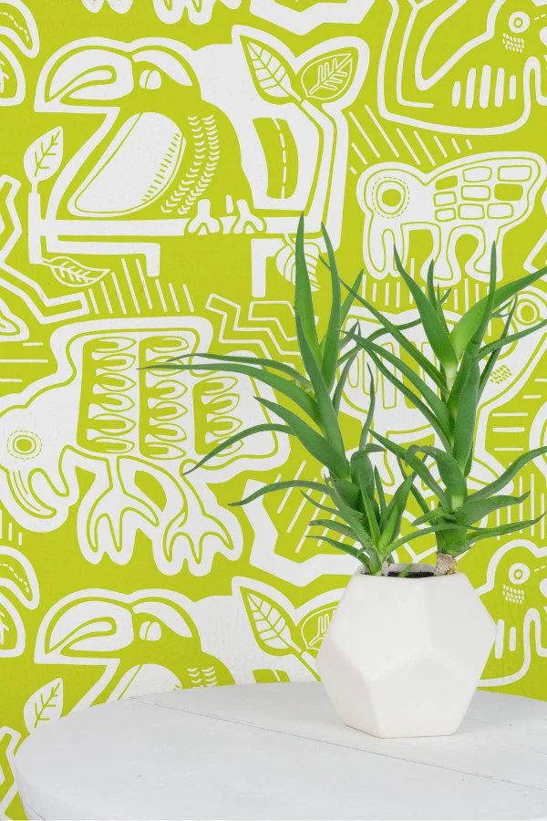 lime and white green patterned wallpaper in kuna design