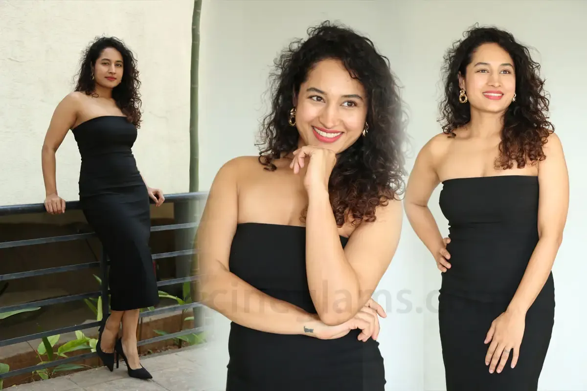 Pooja Ramachandran looks stunning at the Hathya movie teaser launch event, showcasing elegance in a chic outfit with subtle accessories and a radiant smile