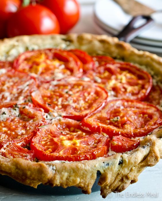 This Goat Cheese and Tomato Tart with Rosemary and Mascarpone is an easy to make recipe that should be on everyone's summer menu.