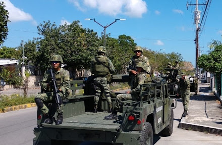 Balacera en Cancún: Policías y sicarios se enfrentan, 4 detenidos serían autores de triple-ejecución en R-100 