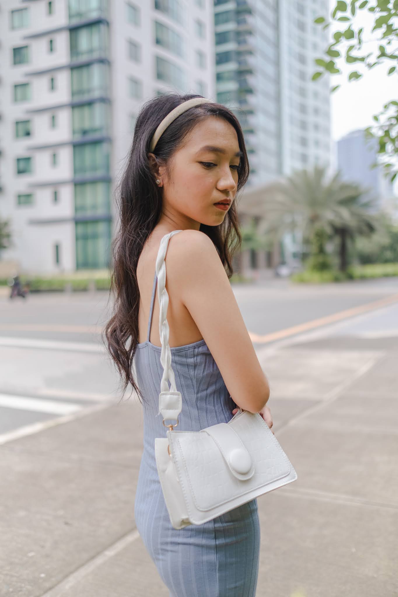 Cielo Fernando Wearing Blue Dress with White Bag