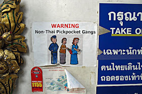 warning sign at Thai airport