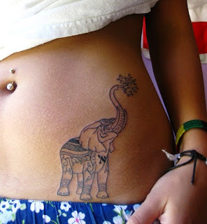 http://allaboutbodyart.blogspot.com/ elephant_tattoo_girl_tattoos_hip_tattoo_designs