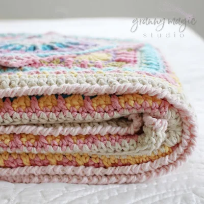 Crochet Jackfield Tile blanket folded for storage.