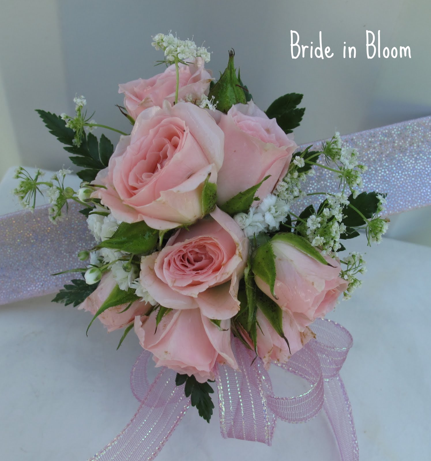 Pink rose wrist corsage, weddings or prom