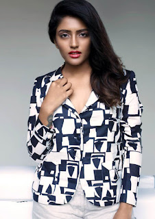 south indian actress eesha rebba in white pant and white coat with black blocks