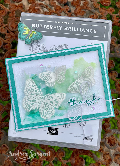 Embossed butterflies flying over an alcohol wash of colour is a lovely way to say "thank you".