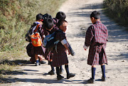 Children in school uniform, these young kids walk up to 2 hours each way to . (school children)