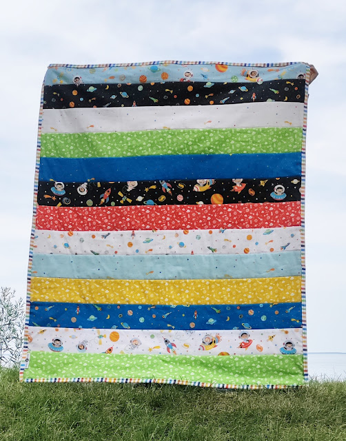 The striped side of the double-sided QAYG quilt