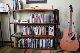 one of several rapidly filling bookcases