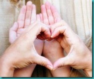 heart image formed with human hands