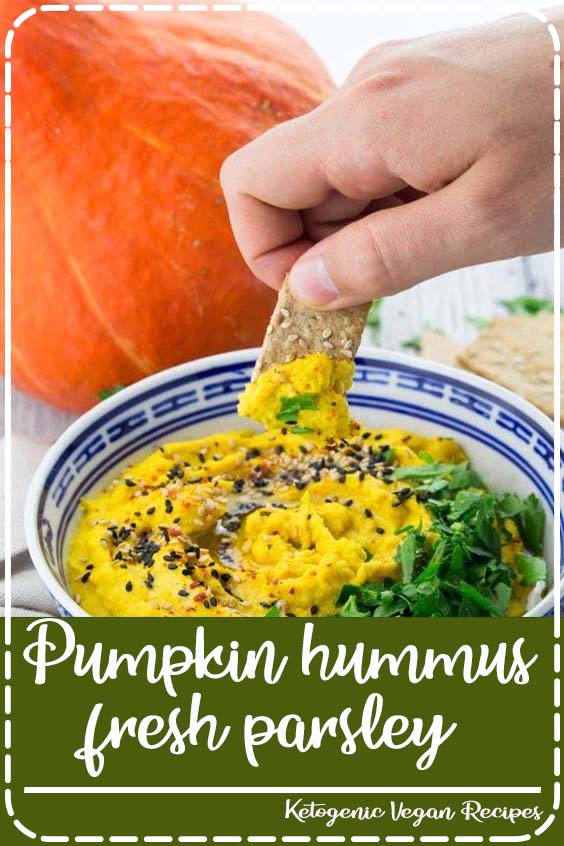 This pumpkin hummus with fresh parsley and sesame seeds is the perfect snack or appetizer for fall! It’s super delicious, packed with protein, and really easy to make! It's one of my favorite hummus recipes! #vegan #hummus #fallrecipes