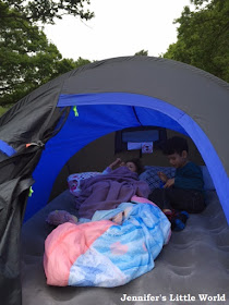 Children sleeping in a tent
