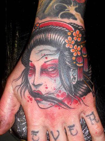 11 Enchanting Geisha Hand Tattoos