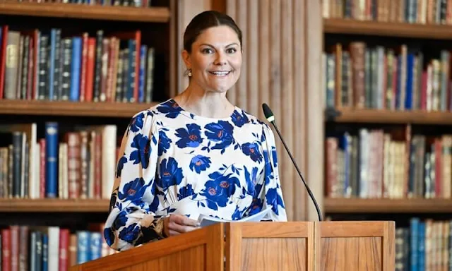 Crown Princess Victoria wore a poppy Alize midi dress by Malina. Victoria presented the gold medals of Federation of Swedish Farmers