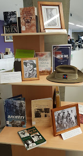 ANZAC display showing books and photographs