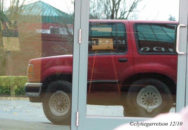 I also like the double reflections the reflection in the car window is a
