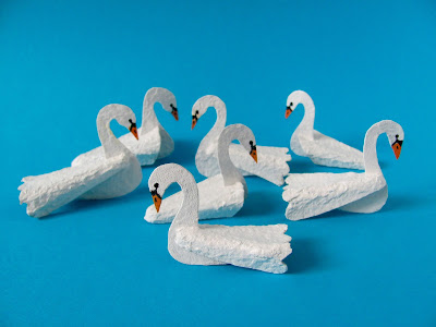 7 swans a swimming