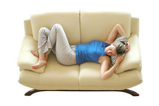 woman relaxing on clean upholstery