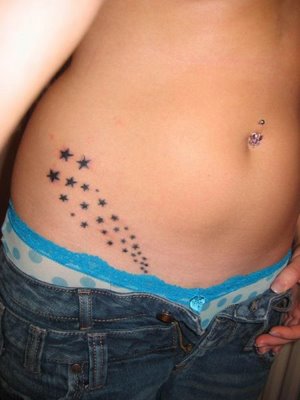 A shooting STAR TATTOO would