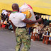 Nigerian Strongest Soldier Uses Teeth To Drag A Hilux Van, Others