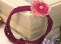 http://www.letsknit.co.uk/free-knitting-patterns/girls_crocheted_flower_headband