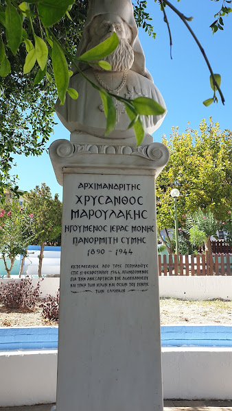 stone bust atop an inscribed plinth