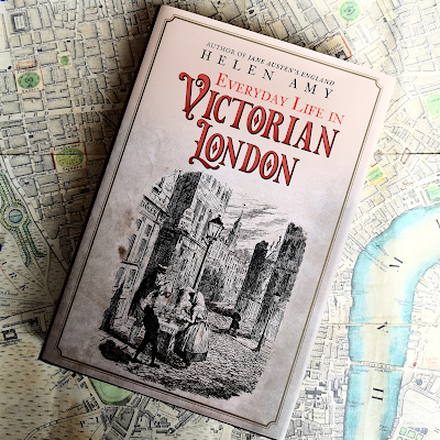 Front cover of Everyday Life in Victorian London by Helen Amy with map of London background